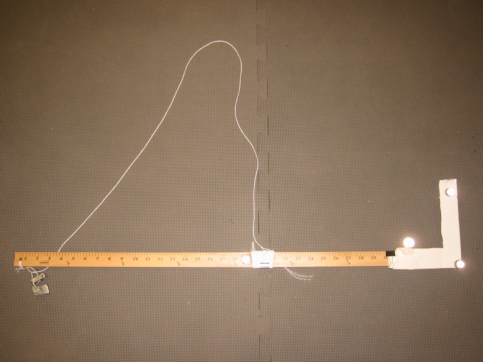 Measuring stick used as guitar prop for motion capture