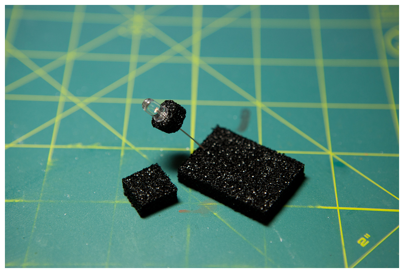 LED inserted through sponge into neck tube