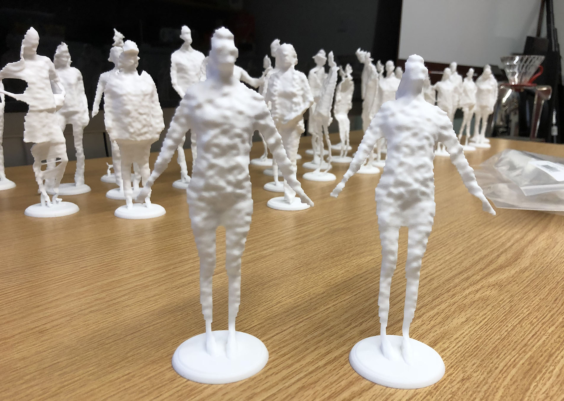 Collection of raw 3D-printed sculptures before finishing